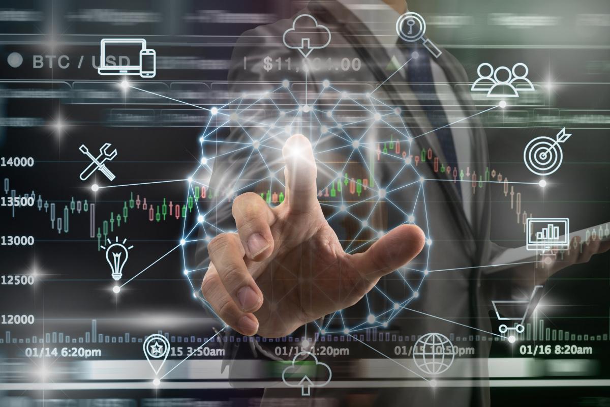 Man working on digital network diagram